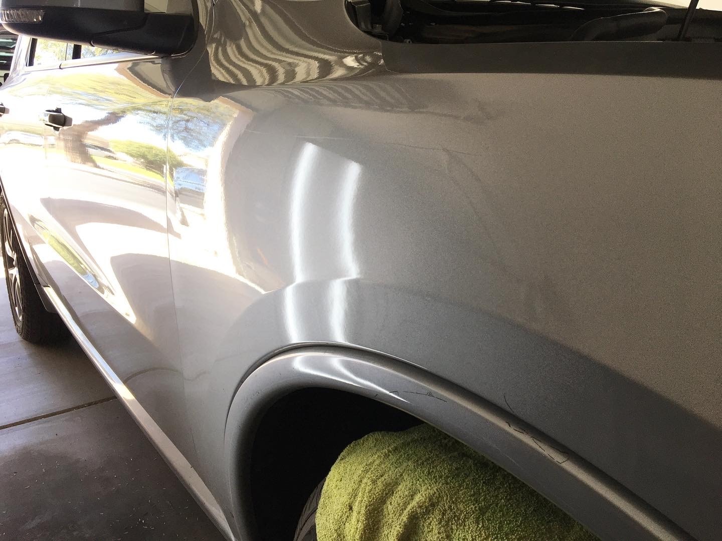 Gray truck fender smooth and restored after paintless dent repair
